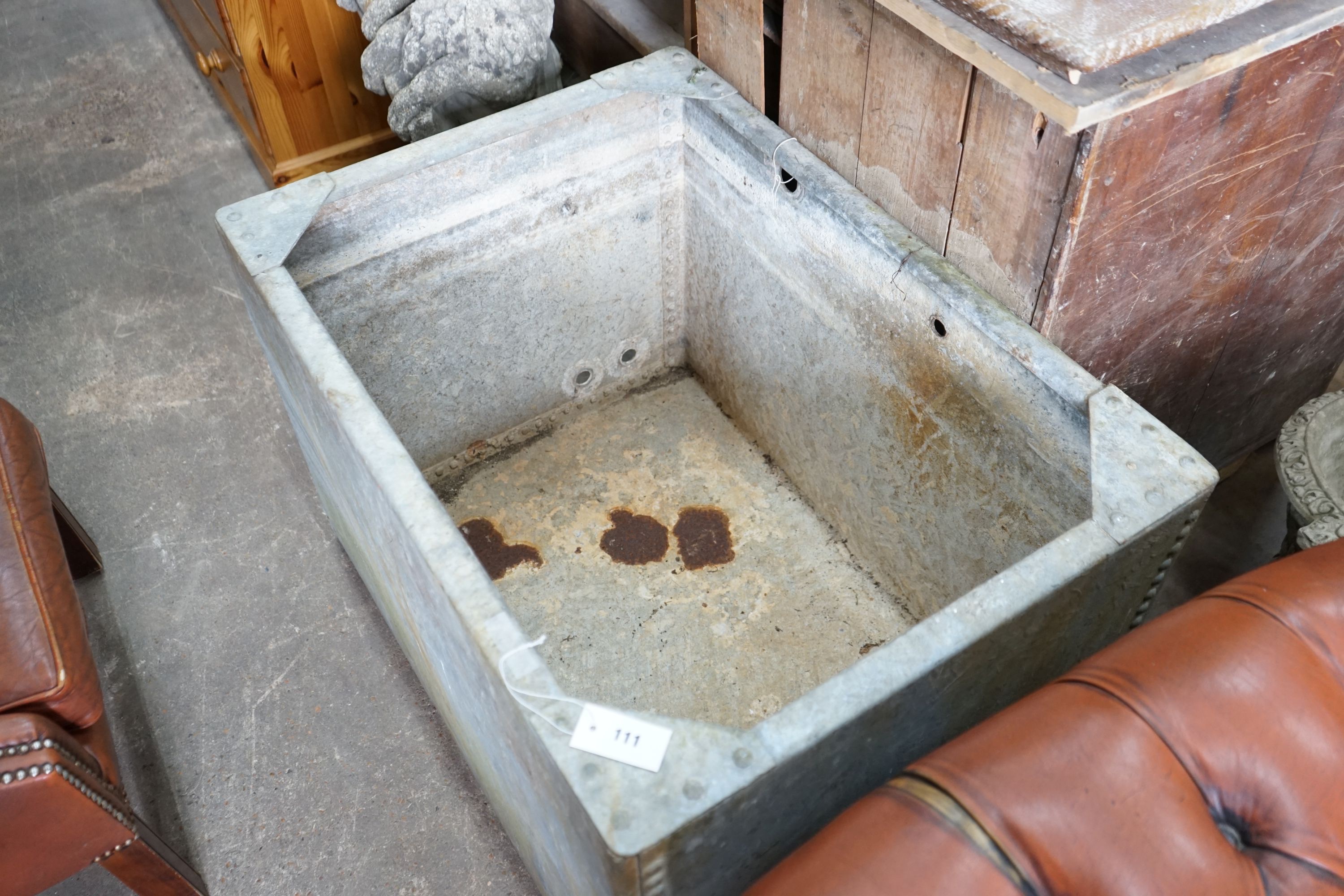 A rectangular galvanised water tank, width 90cm, depth 65cm, height 60cm